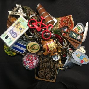 Collected over many years of hosting delegations from the Department of State's International Visitor Leadership Program the keychains represent various symbols of the visitors' countries.